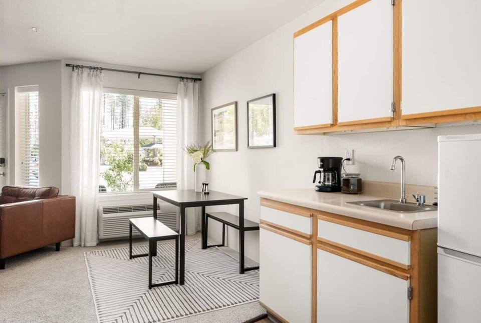Kitchenette with microwave, mini-fridge, and coffee maker. Perfect for a quick breakfast to enjoy on the patio!