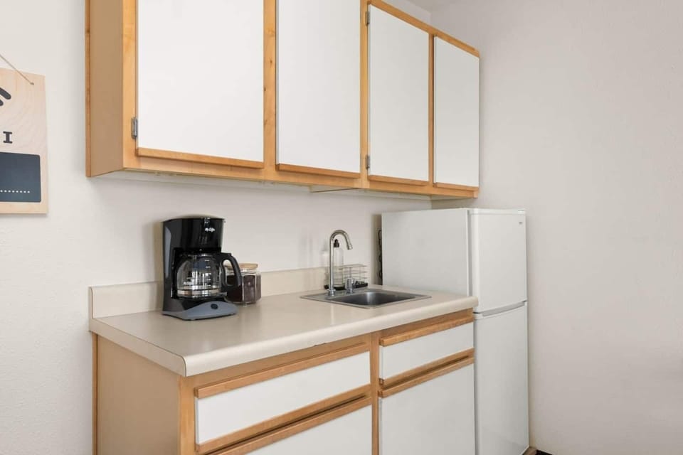 Kitchenette with microwave, mini-fridge, and coffee maker. Perfect for a quick breakfast to enjoy on the patio!