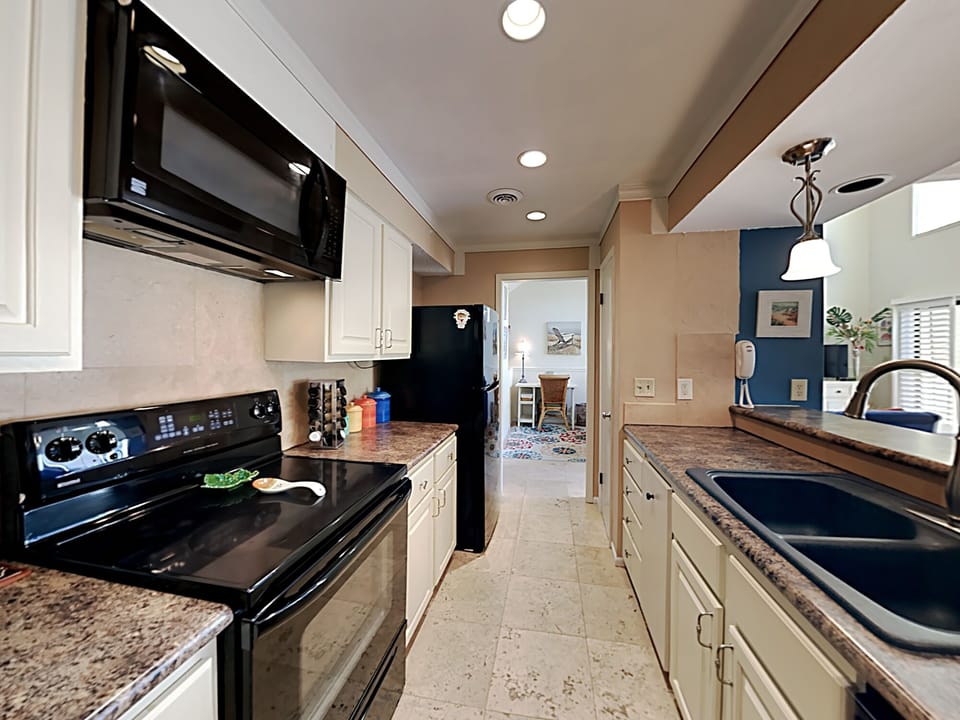 Condo (#28 - No Pets) | Private kitchen | Fridge, microwave, oven, stovetop