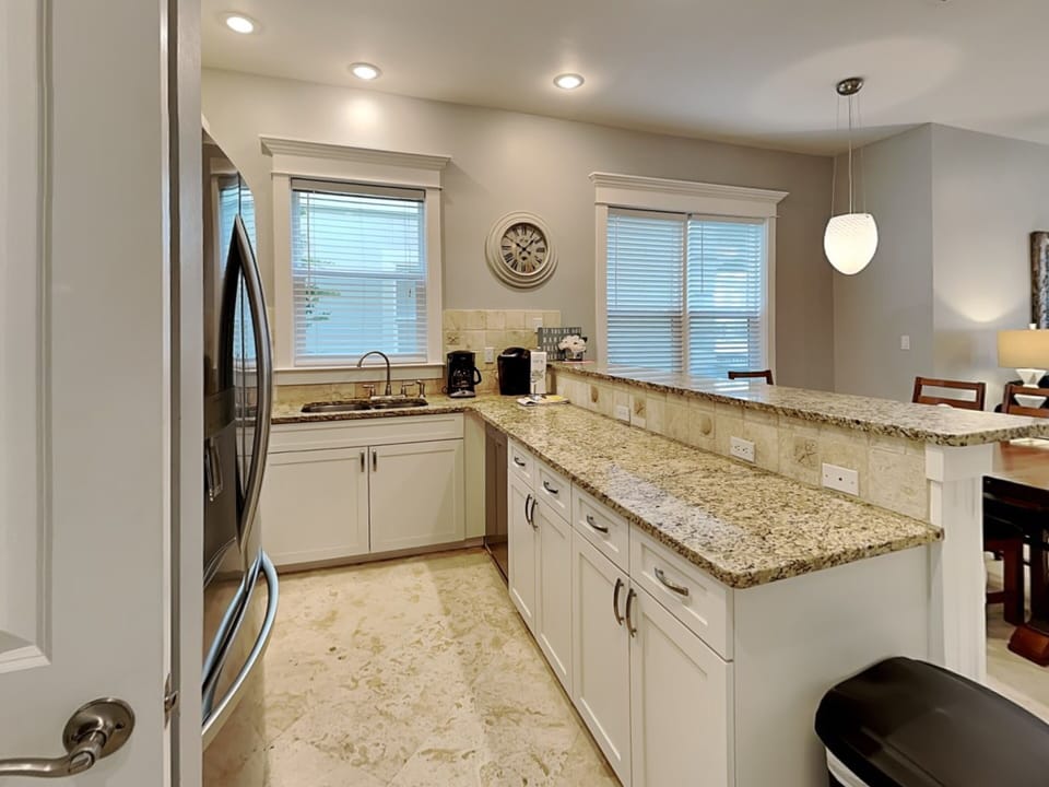 Condo, Multiple Beds, Balcony (#103 - No Pets) | Private kitchen | Fridge, microwave, oven, stovetop