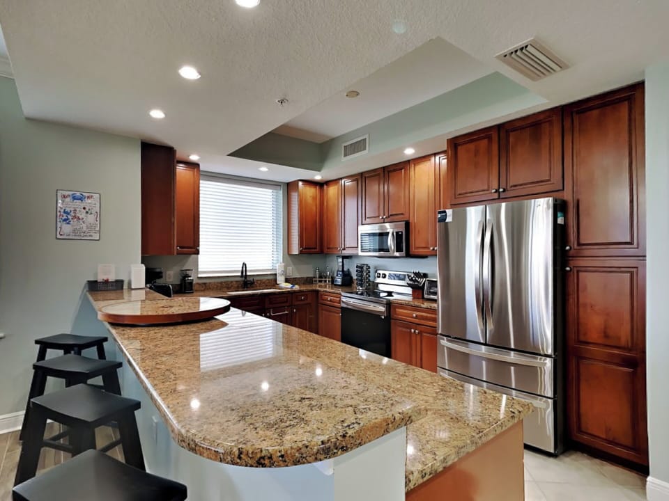 Condo, Multiple Beds, Balcony (#705B - No Pets) | Private kitchen | Fridge, microwave, oven, stovetop