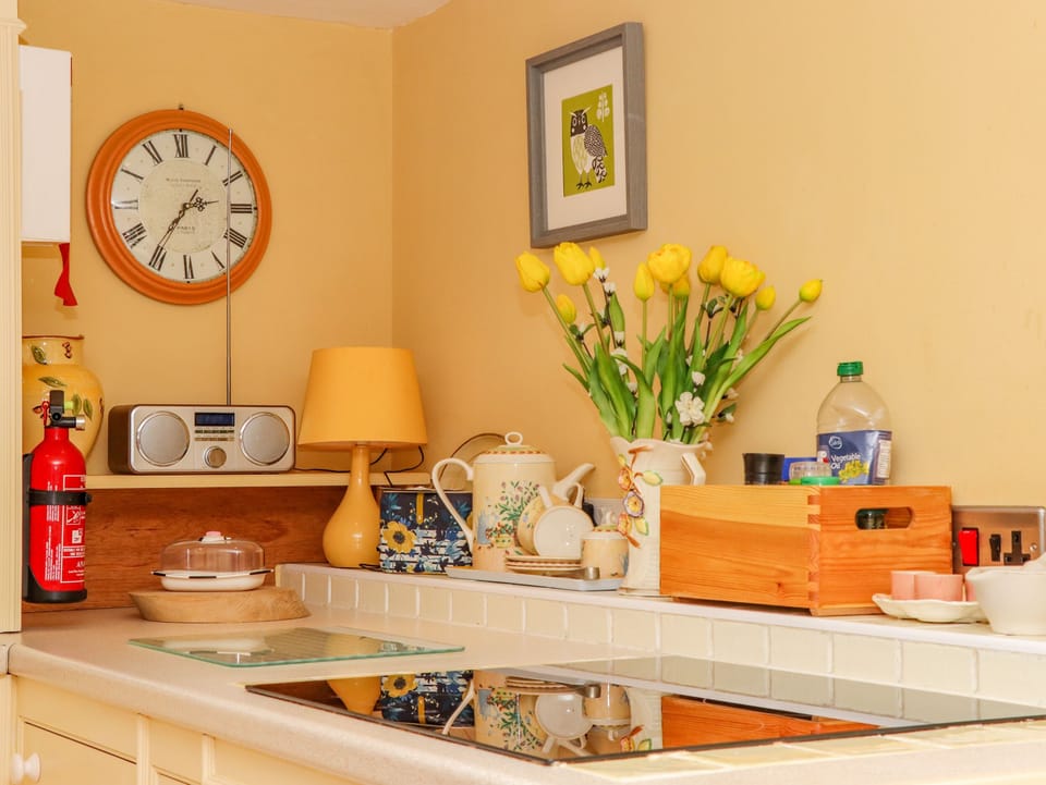Fridge, electric kettle, toaster, cookware/dishes/utensils