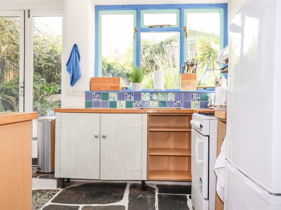 Fridge, dishwasher, electric kettle, cookware/dishes/utensils