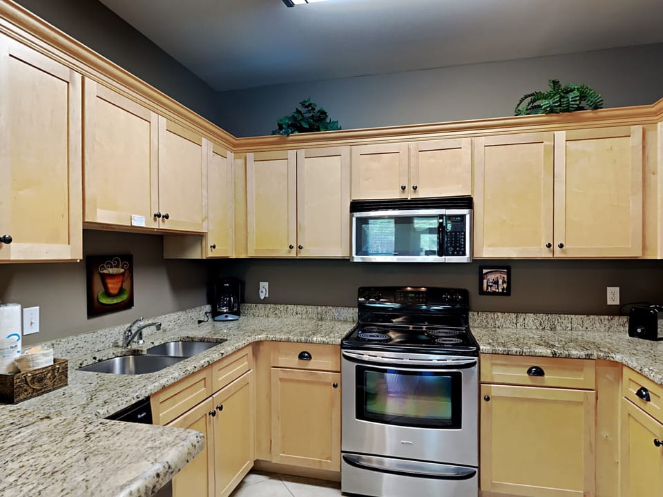 Condo, Multiple Beds, Balcony (#713 - No Pets) | Private kitchen | Fridge, microwave, oven, stovetop