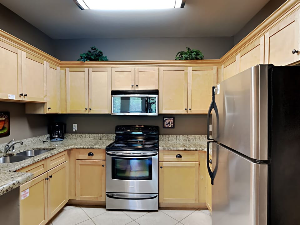Condo, Multiple Beds, Balcony (#713 - No Pets) | Private kitchen | Fridge, microwave, oven, stovetop
