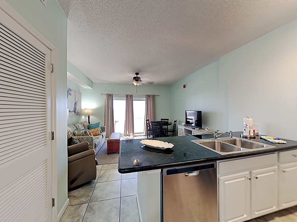 Condo, Multiple Beds, Balcony, Pool View (#002 - No Pets) | Private kitchen | Fridge, microwave, oven, stovetop