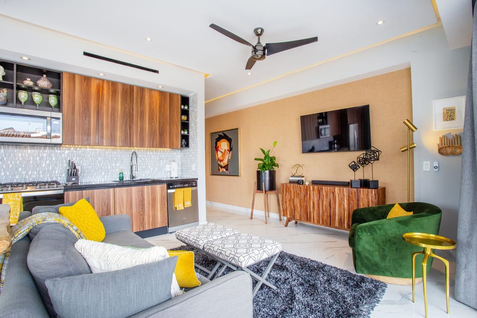The living room features a 3rd smart TV