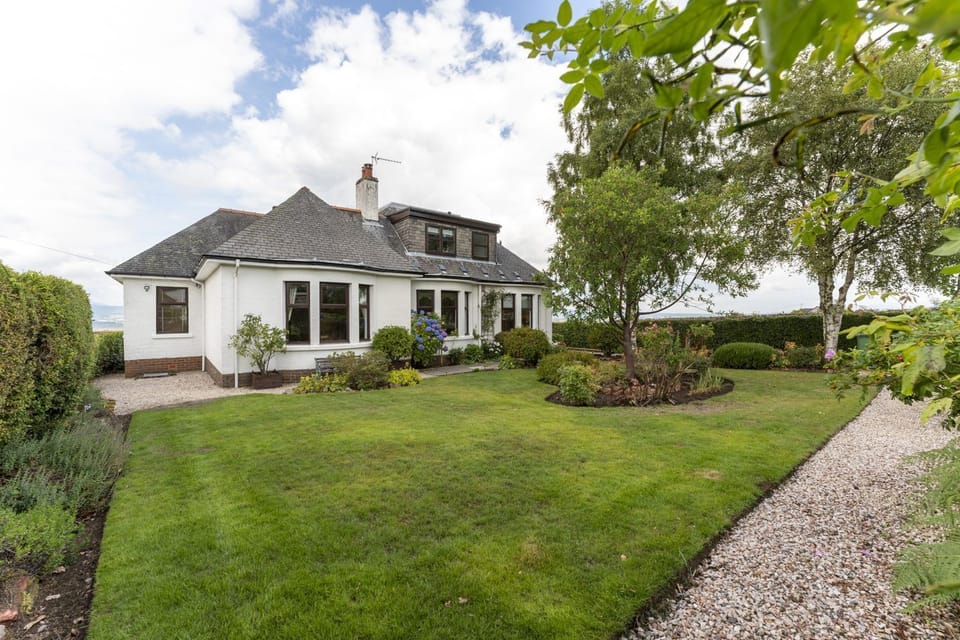 Surrounded by mature gardens