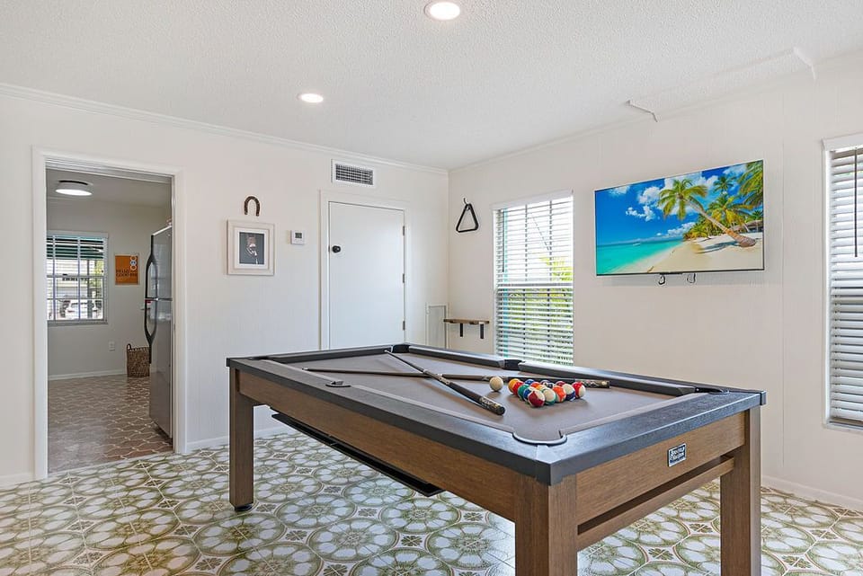 Billiards room with TV