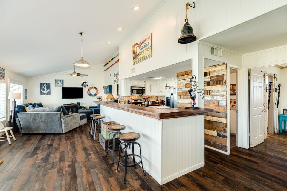 Serve or enjoy meals at the long breakfast bar