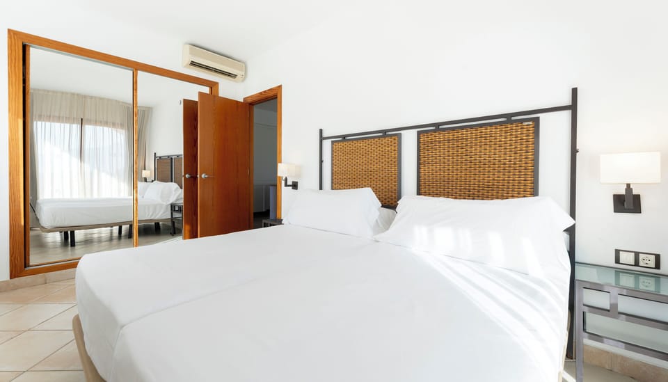Premium bedding, down comforters, Select Comfort beds, in-room safe