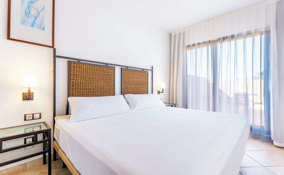 Premium bedding, down comforters, Select Comfort beds, in-room safe
