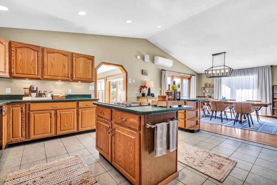 Large and well stocked open concept kitchen with walk-in panty