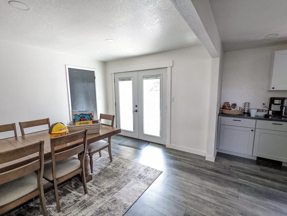 Dinning Room. Exit those doors to the backyard & pool.