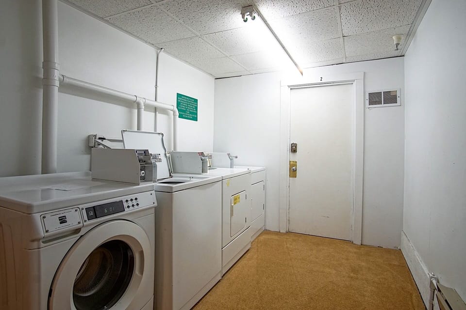 Communal coin operated laundry facility for Snowcrest guest