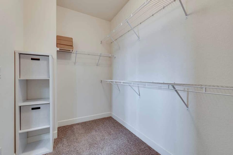 There’s plenty of storage space in the walk-in closet.