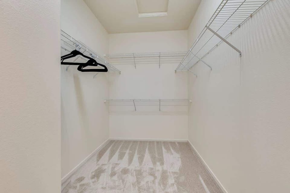 There's plenty of storage space in the walk-in closet.