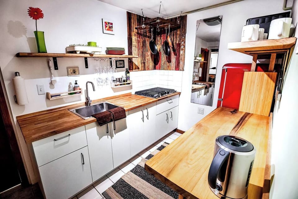 Kitchen with tea kettle. Of course we provide good quality black and green tea