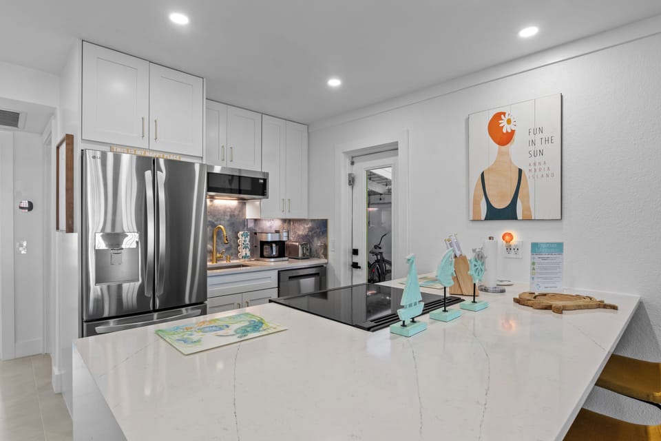 The kitchen which includes a full set up plus a blender, air fryer and more