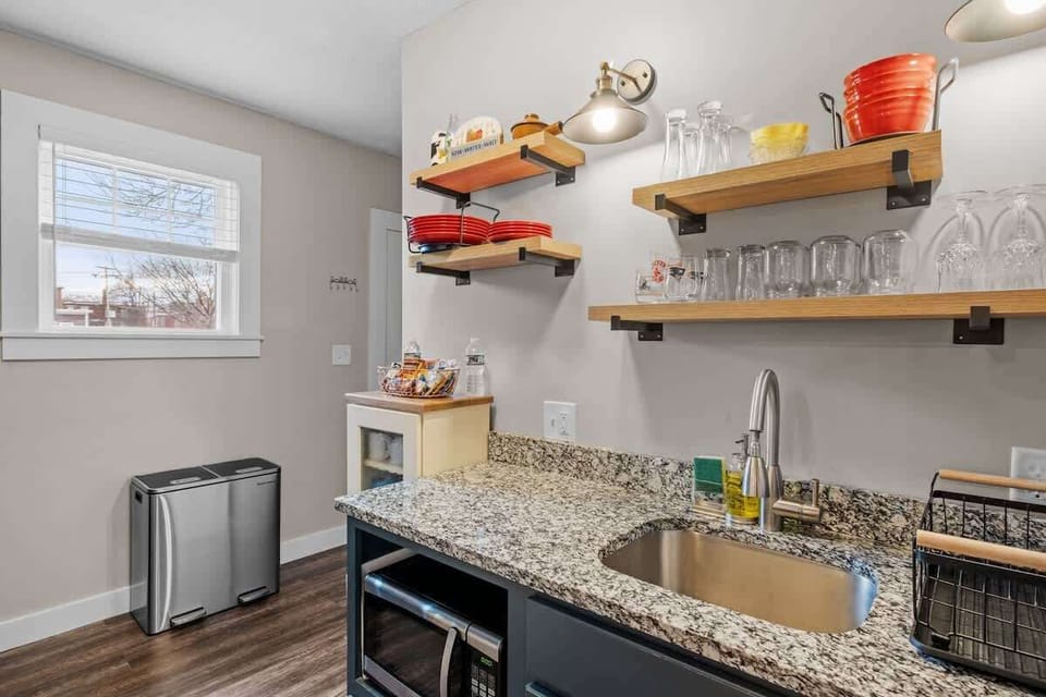 Experience culinary bliss in our fully-equipped kitchen, boasting state-of-the-art appliances and exquisite granite countertops for the ultimate cooking