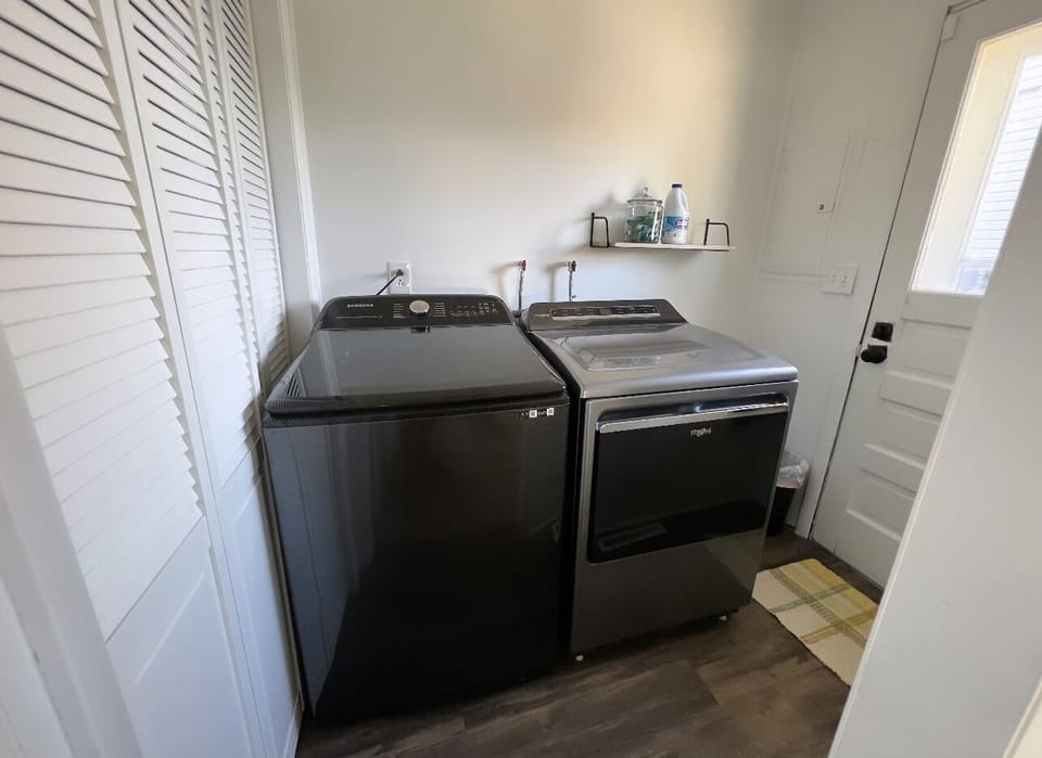 Washer and dryer with tide pods and bleach provided 