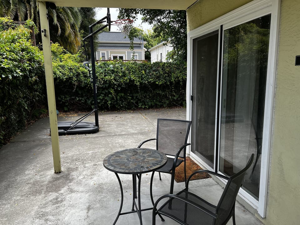 Patio area with table and chairs