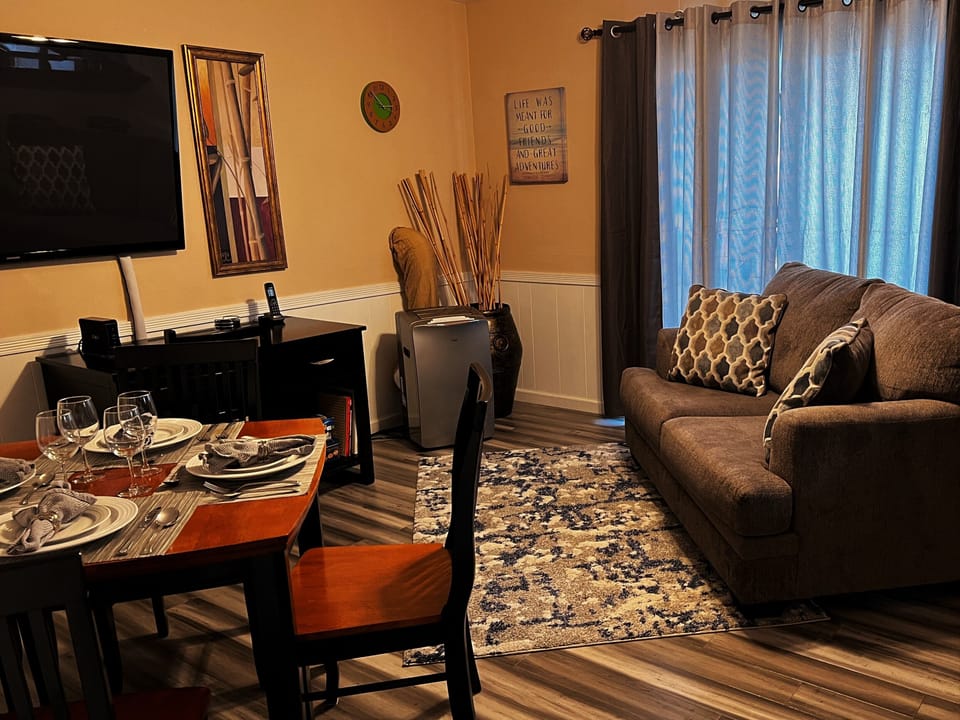 Family/Dining Room, table for 4, TV, desk w/chair, AC/heating unit, sofa