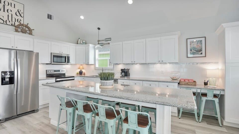 Kitchen area with bar seating for 10!