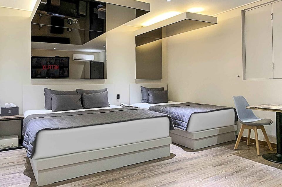 Premium Twin Room | Premium bedding, down comforters, memory foam beds, desk