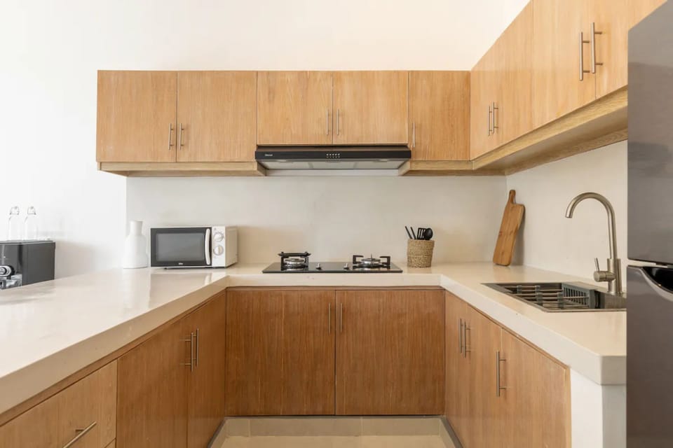 Deluxe Villa, 2 Bedrooms | Private kitchen | Coffee/tea maker, electric kettle, toaster, highchair