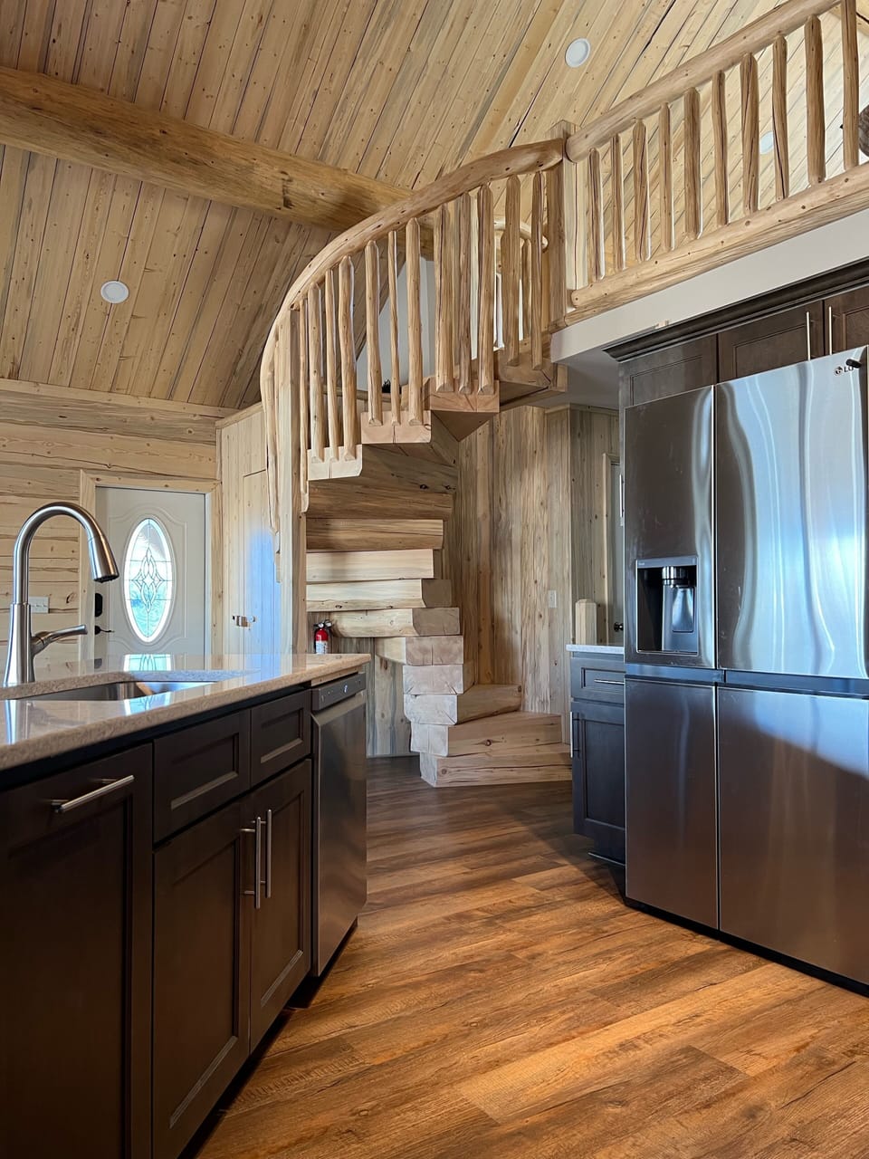 Beautiful spiral staircase leading up to the loft.