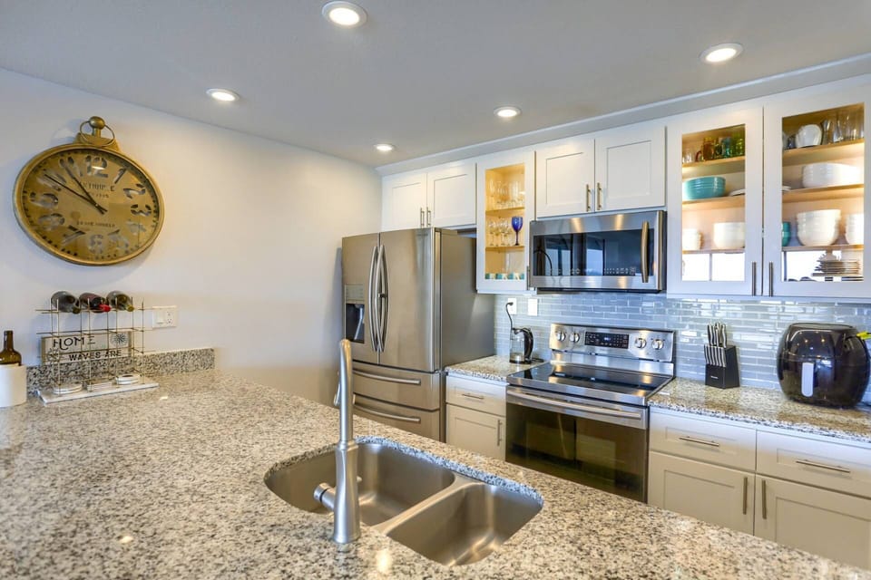 Updated Kitchen with Granite Countertops and Stainless Steel Appliances