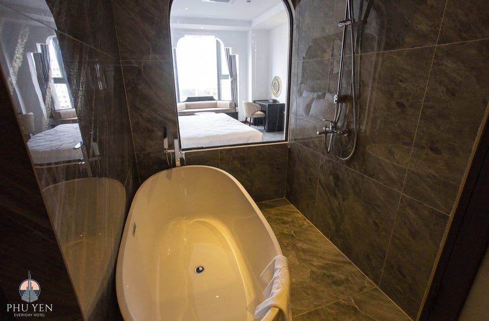 Rainfall showerhead, designer toiletries, hair dryer, bathrobes