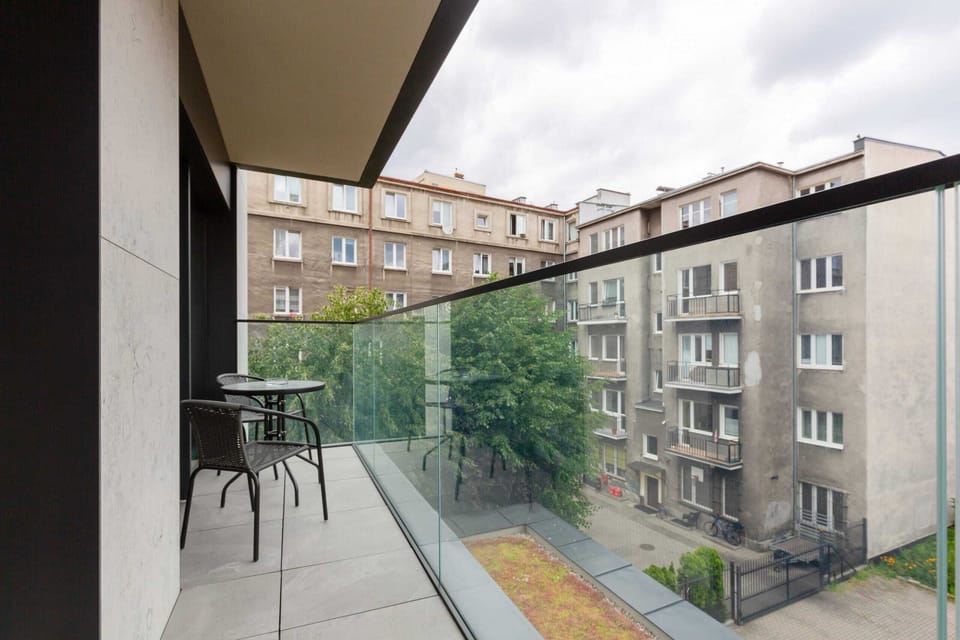 The furnished balcony is a comfortable place to spend time outdoors, the balcony offers a view of the surrounding area.