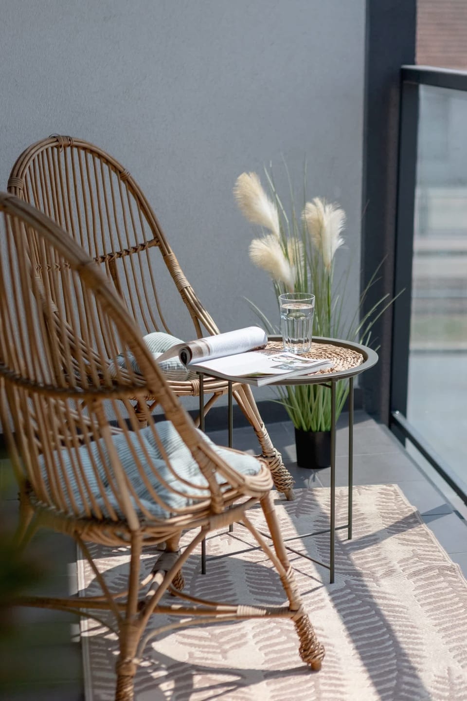 Chairs and a table on the balcony.