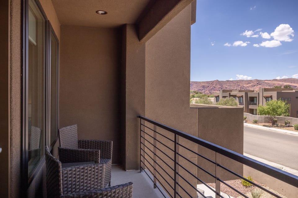 Private Back Patio - Located in the upstairs bedroom this balcony creates a private seating area to enjoy a little quiet time for yourself.