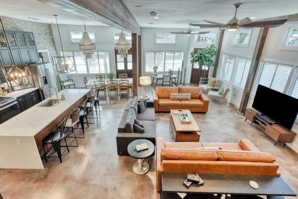 Expansive Living area with large windows and abundant natural light