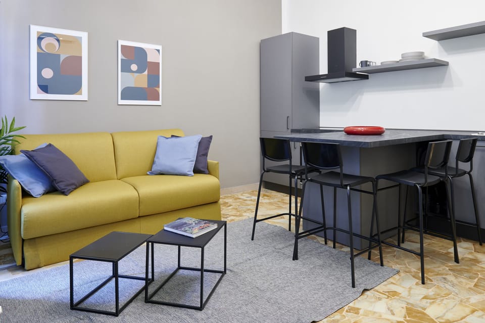 Deluxe Apartment | Living area | 43-inch flat-screen TV with satellite channels, TV