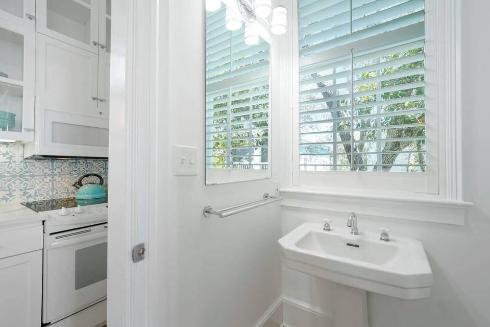 HALF BATHROOM OFF KITCHEN & DINING ROOM