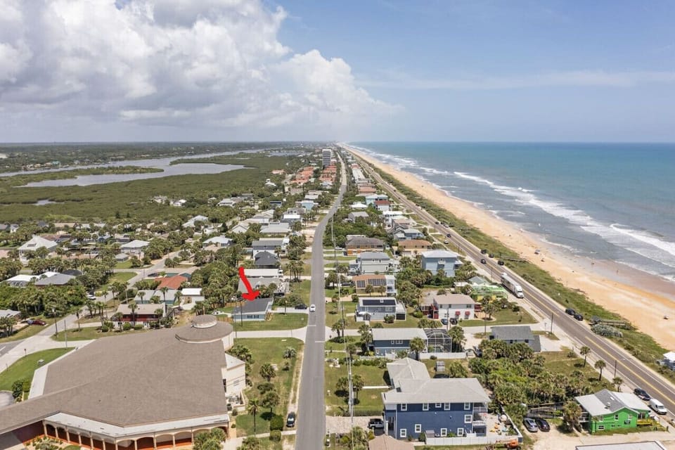 Bird’s-eye view of your perfect beach escape—just one block from the ocean and steps to the sand.