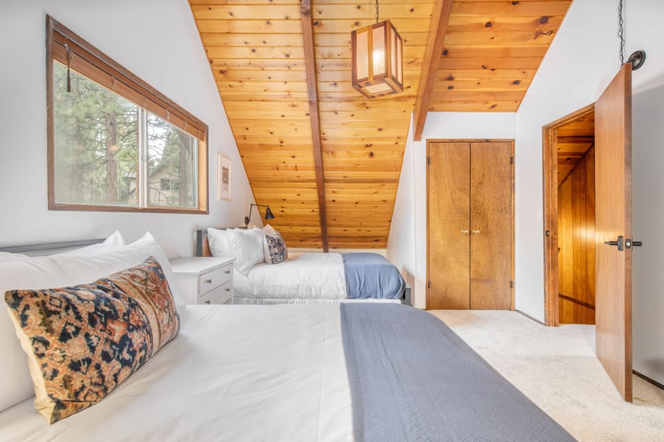 Bedroom 4 features two full beds.