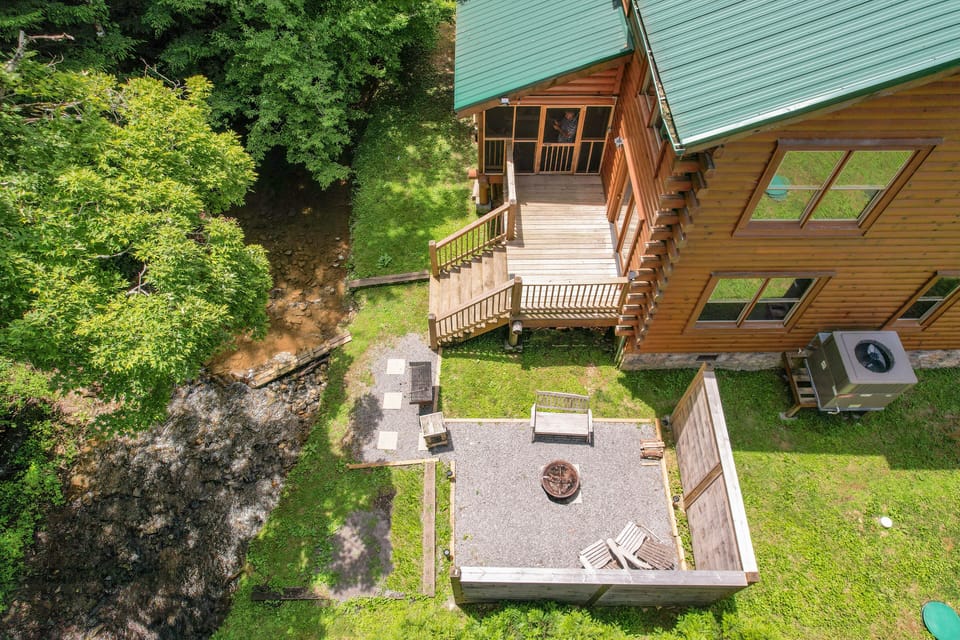 Your Smoky Mountain escape sits right next to a creek.