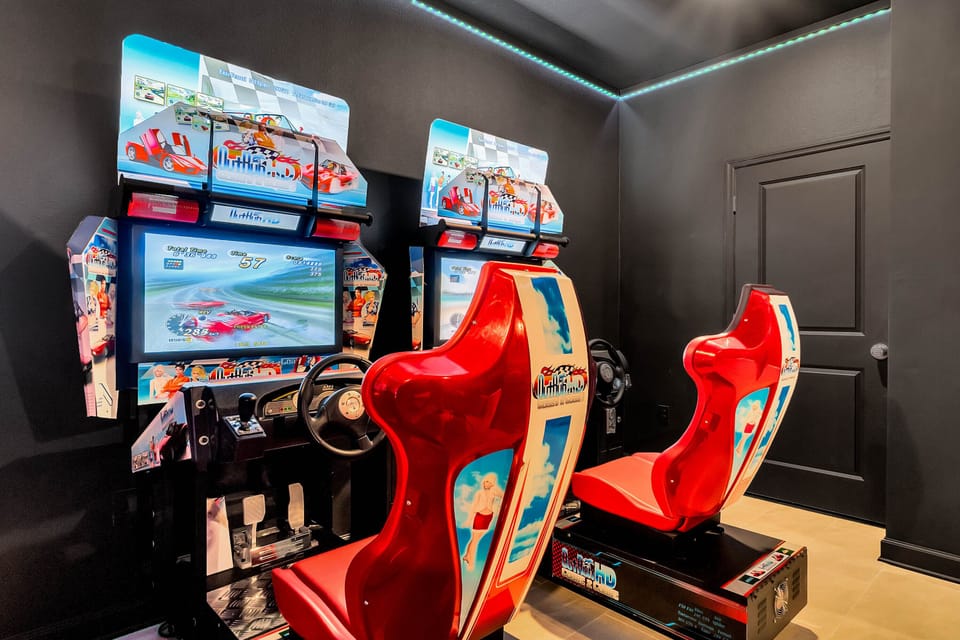 Game Room with two commercial arcade racing games