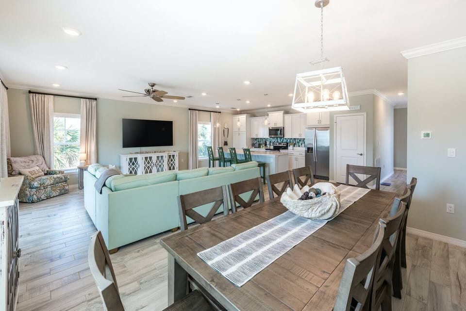 Open living space, center island kitchen, fully stocked chef's kitchen.