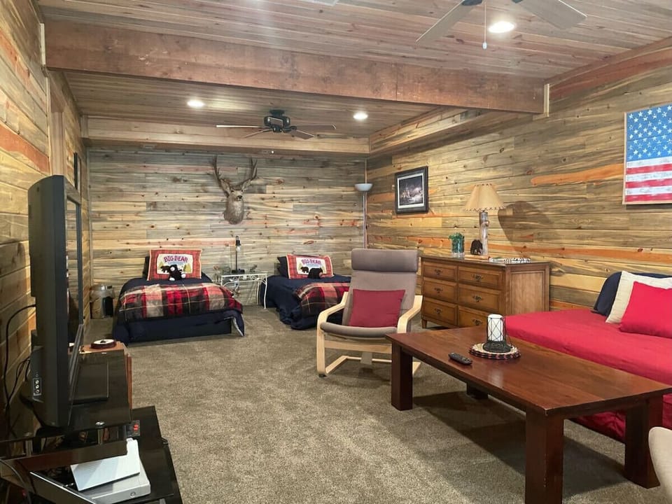 Family room with 3 single beds and rustic feel