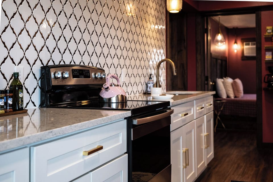 The Diamond’s kitchen is as functional as it is stylish—with a sleek tile backsplash, full-size appliances, and a coffee station stocked with options. Whether you're cooking a meal or prepping snacks for a group, everything you need is right here.