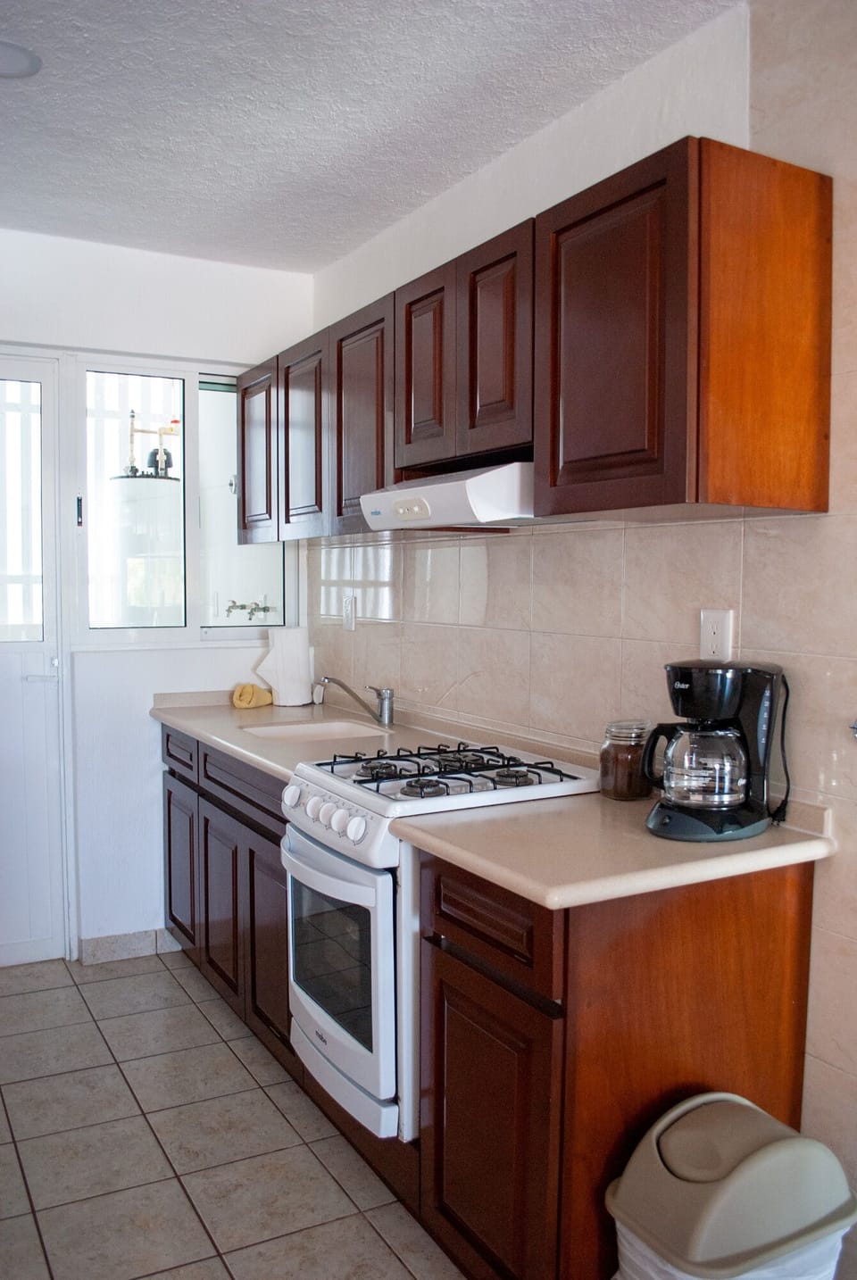 Condo, 2 Bedrooms (Beachfront, 2 Bathroom) | Private kitchen | Full-size fridge, microwave, oven, stovetop