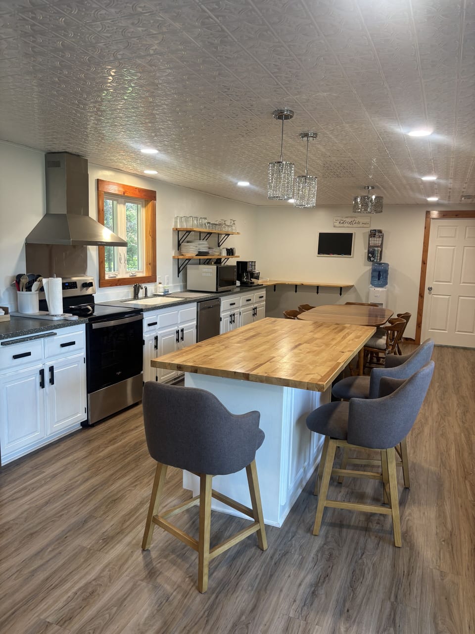 Kitchen area, ample lighting, fresh water cooler
