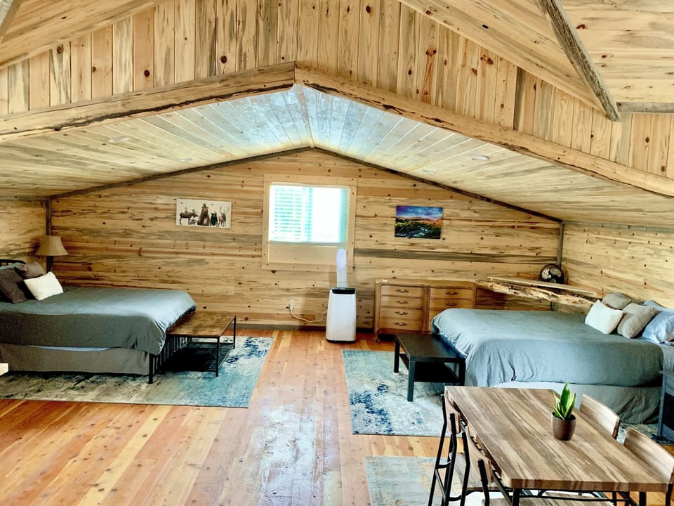 Both beds, dining table and air conditioner for summertime!