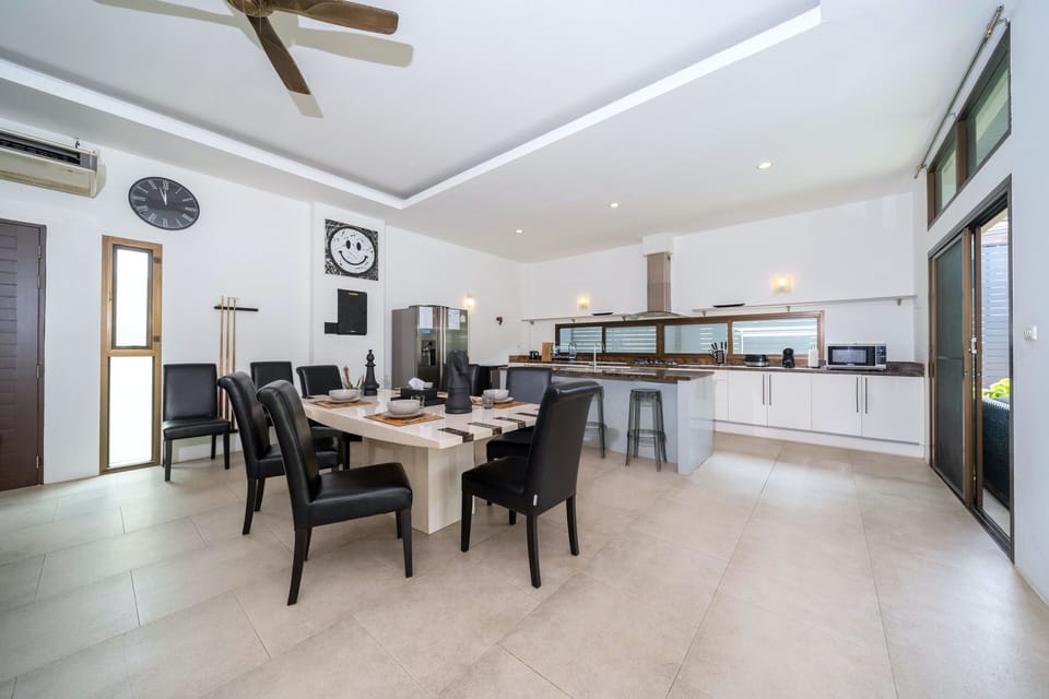 Luxury Villa | Living area | 56-inch TV with cable channels
